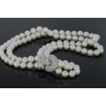 Double row cultured pearl necklace on 15ct white gold diamond set feature clasp, weight 92.9g