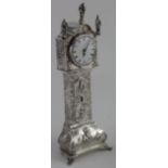 Dutch silver, second standard miniature grandfather clock, shows cherubs frolicking. Looks late