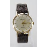 Gents 9ct cased wristwatch circa 1960 on a leather strap, presentationally engraved on the back of