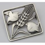 Georg Jensen sterling silver brooch (no. 250), depicting birds on a head of barley, designed by Arno