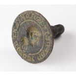 An early bronze intaglio seal / stamp matrix, possibly Medieval, seal depicts a head and shoulders