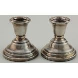 Two silver loaded dwarf candlesticks hallmarked S&M. Birm. 1968.