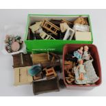 Dolls house interest. A collection of dolls house furniture and dolls, including fireplaces, bath