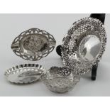 Four small silver dishes - two are 800 German silver and two are British hallmarked for Sheffield
