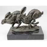 Pair of Bronze hares, base of statue signed 'Nick' also with inset disc reads 'Bronze Garanti, Paris