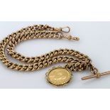 9ct gold hallmarked "T" bar pocket watch chain with Edward VII Sovereign dated 1910 attached. Approx