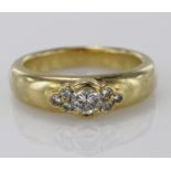 Yellow metal (tests 14ct) Diamond set Ring size M weight 8.6g