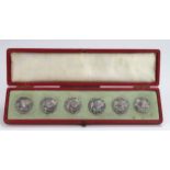 Boxed set of Six Edwardian Art Nouveau Silver Buttons,hallmarked Birmingham 1902, depicting a head