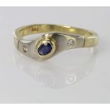 14ct two colour ring set with sapphire and diamonds, finger size N, weight 3.3g