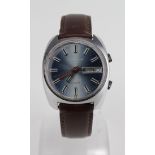 Gents Le Cheminant Automatic Wristwatch, the blue dial with baton markers and Day/Date aperture at 3