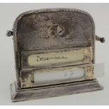 Silver desk calendar with wooden backing hallmarked for Mappin & Webb, Birm. 1908. (Hallmarks are