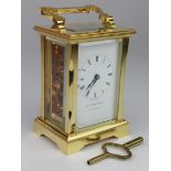 Brass five glass carriage clock by 'Garrard', key present, height 11.5cm approx.