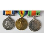 BWM & Victory Medal and Defence Medal mounted on bar. Attempted erasure of the WW1 medals, however