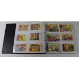 Comic humour, varied selection saucy postcards housed in modern album, wide range of artists and
