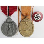 German Nazi Russian Front Medal maker marked, West Walls Medal, and an NSDAP pin badge maker