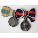 Jubilee Medal 1897 (silver), with a 1902 Coronation Medal (silver), both on ladies ribbons. (2)