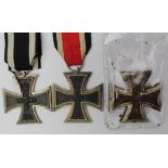 German Iron Cross Medals 2nd Class, WW1 maker marked to ring, WW2 maker marked '52', plus a field