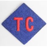 Cloth Badge: T.C. - Traffic Control - Corps Of Military Police WW2 embroidered felt formation sign