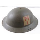 WW2 British helmet stamped J .S. S 1941 on brim with dive flash painted on one side M I on yellow