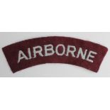 Cloth Badge: Airborne WW2 embroidered felt shoulder title badge in excellent unworn condition.