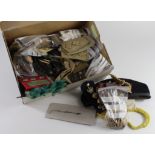 Assorted Militaria in a shoebox. Quantity of badges, buttons, rank insignia, lanyards, side hat,