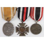 German West Wall medal with German War Merit medal and German 1914-1918 Cross of Honour.