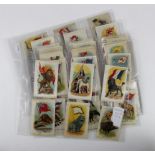Imperial Tobacco Company of Canada, complete set in pages, Animal & Flags (silk) mixed condition,