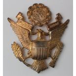 Badge - US Army Officers silver gilt cap badge, marked 'Sterling'.