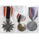 German Luftshutz Civil Defence medal with War Merit Cross with Swords and War Merit Medal. (3)