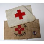 German WW2 Red Cross armband an SS marked ditto and enamel badge