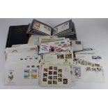Box of assorted World FDC's, in 3x albums and loose. A small number of Commercial Covers. A wide