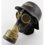 German Helmet a Luftschutz Gladiator Helmet displayed on a head with gasmask, very effective display