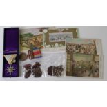 Japan a cased Order and Chinese Invasion medal, a selection of scarce postcards and some Chinese War