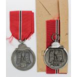 German Nazi Russian Front Medals, one with Packet of issue. (2)