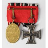 German WW1 Iron Cross 2nd Class mounted with an 'Old Comrades' Medal. (2)