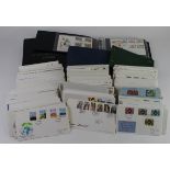 Box of various GB FDC's loose and in albums, circa mid 1960's to 2010. Some better noted. (Qty)
