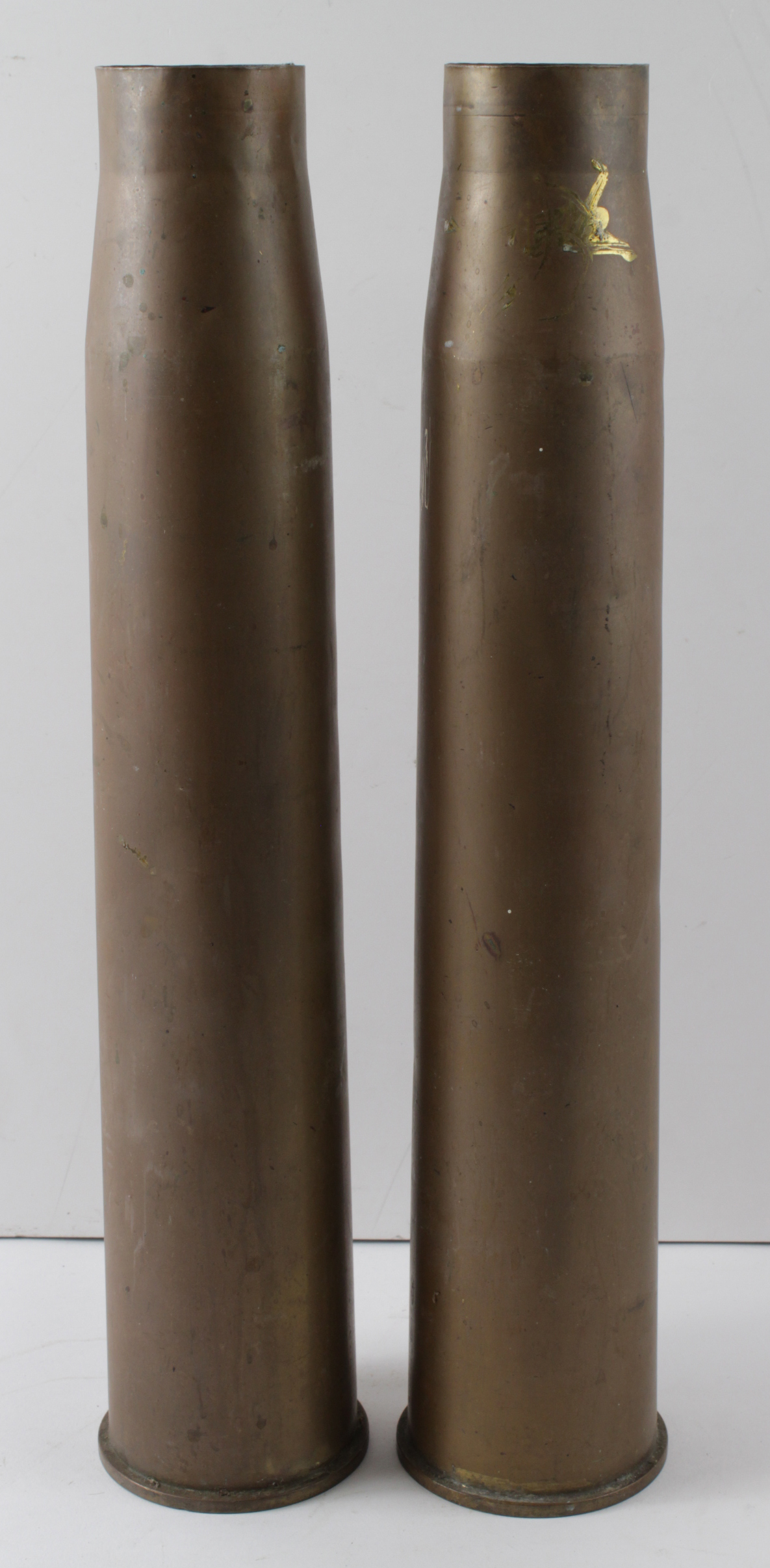Shell cases pair of WW2 dated 6 pd brass cases.