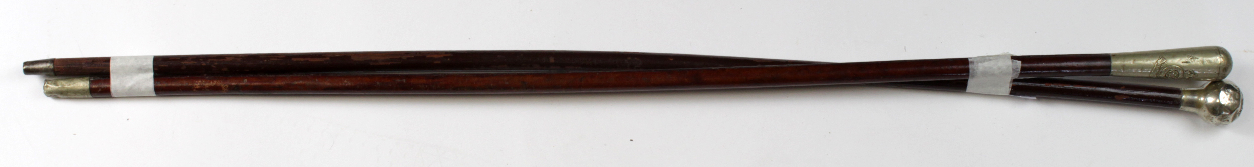 Swagger sticks, a Royal Fusiliers example, the second unidentified. (2)