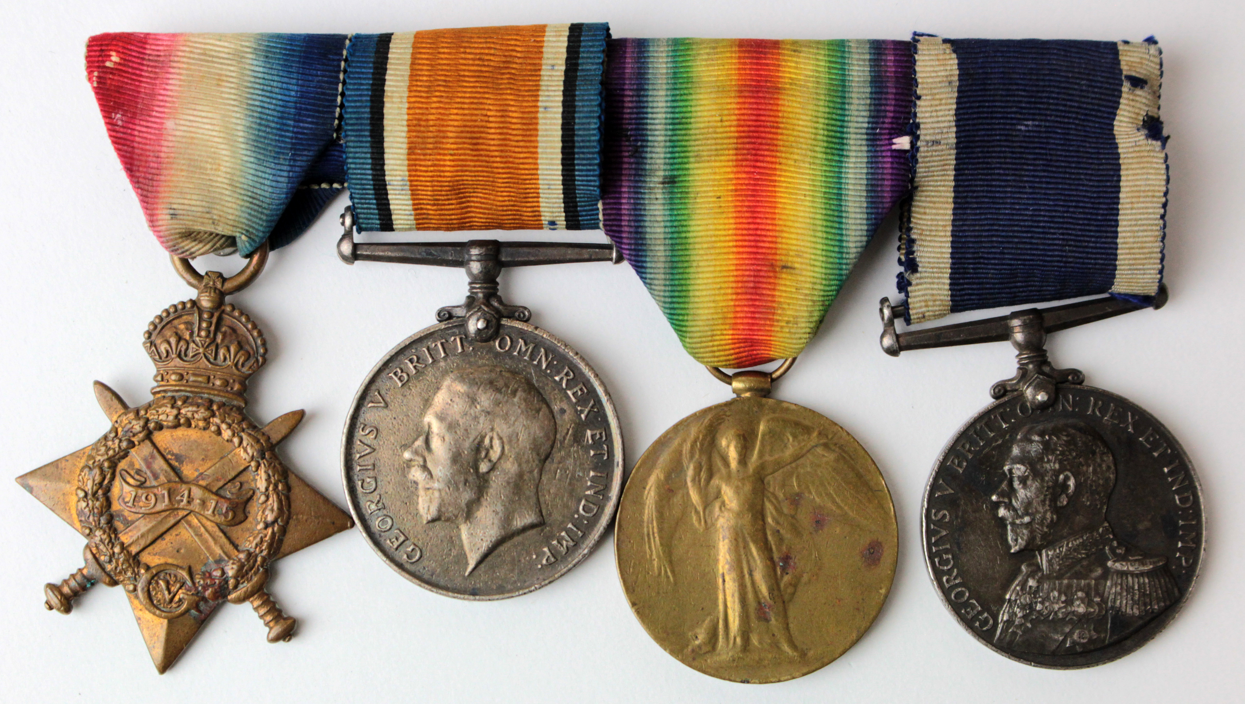 1915 Star Trio (R.M.B. 1270 MUS. M A Kirk) with GV Naval LSGC Medal (R.M.B.2993 M A Kirk MUS. HMS