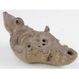 Roman ca.200 AD terracotta grotesque oil lamp with three handles for hanging, 130mm