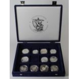 World Silver Proofs (11) with nine being Crown-size, all depicting Ships / Explorers. FDC in a "