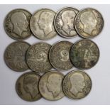 Iraq (11) 20thC silver 50 Fils coins, mixed grade.