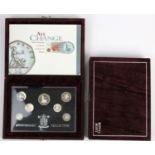 Proof Sets (2) both 1996 "25th Anniversary" Silver Proof in the purple velvet case. aFDC but with