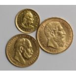 World Gold Coins (3): Belgium 20 Francs 1875 EF, Prussia 10 Mark 1873C VF scratched, and Peru