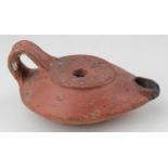Roman north African ca.200 AD terracotta oil lamp with floral motif, 120mm