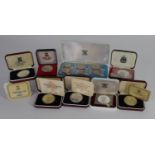 Isle of Man cased proof crowns (7) all silver but one, and a Decimal Proof Set 1971 casd.