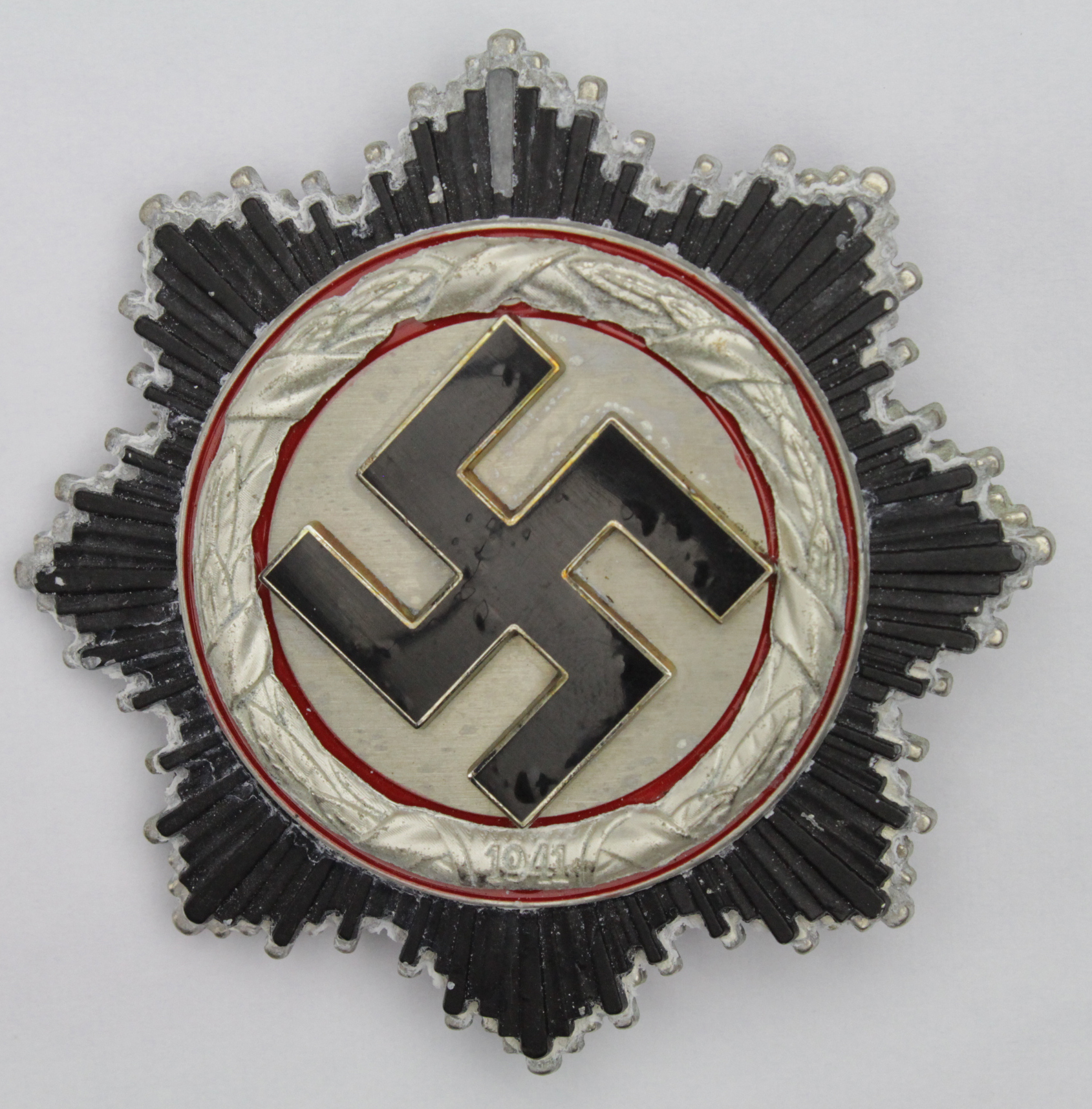German Deutches Cross in Silver 1941 Type A, in very good condition medal toned to front cross in