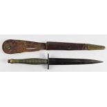 F.S. Knife: A scarce ribbed & beaded brass handled WW2 Fairburn Sykes Commando knife. Grip barrel