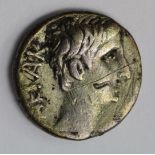Octavian silver quinarius, struck Rome?, 29-28 B.C., reverse:- Victory standing left on cista