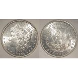 USA Morgan Silver Dollar 1900-S, UNC, in an ersatz slab (MS66), probably an MS61 or 62.